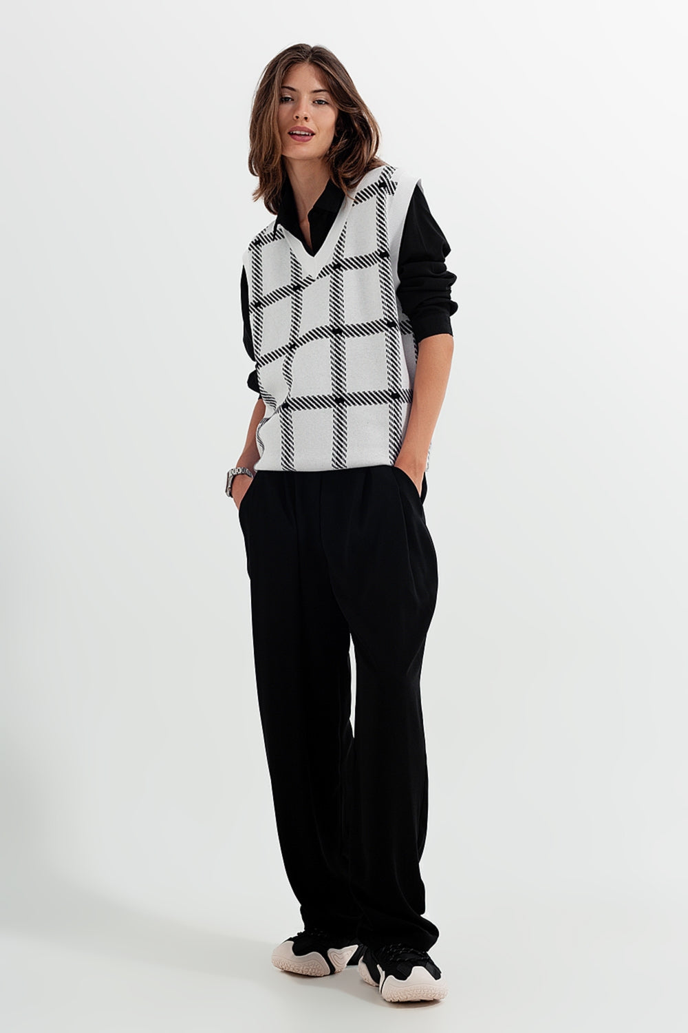 Colete tricotado com grande traçado