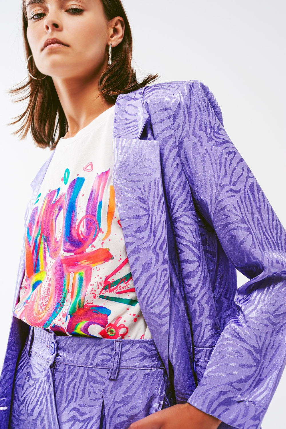 Jaqueta em roxo com impressão zebra