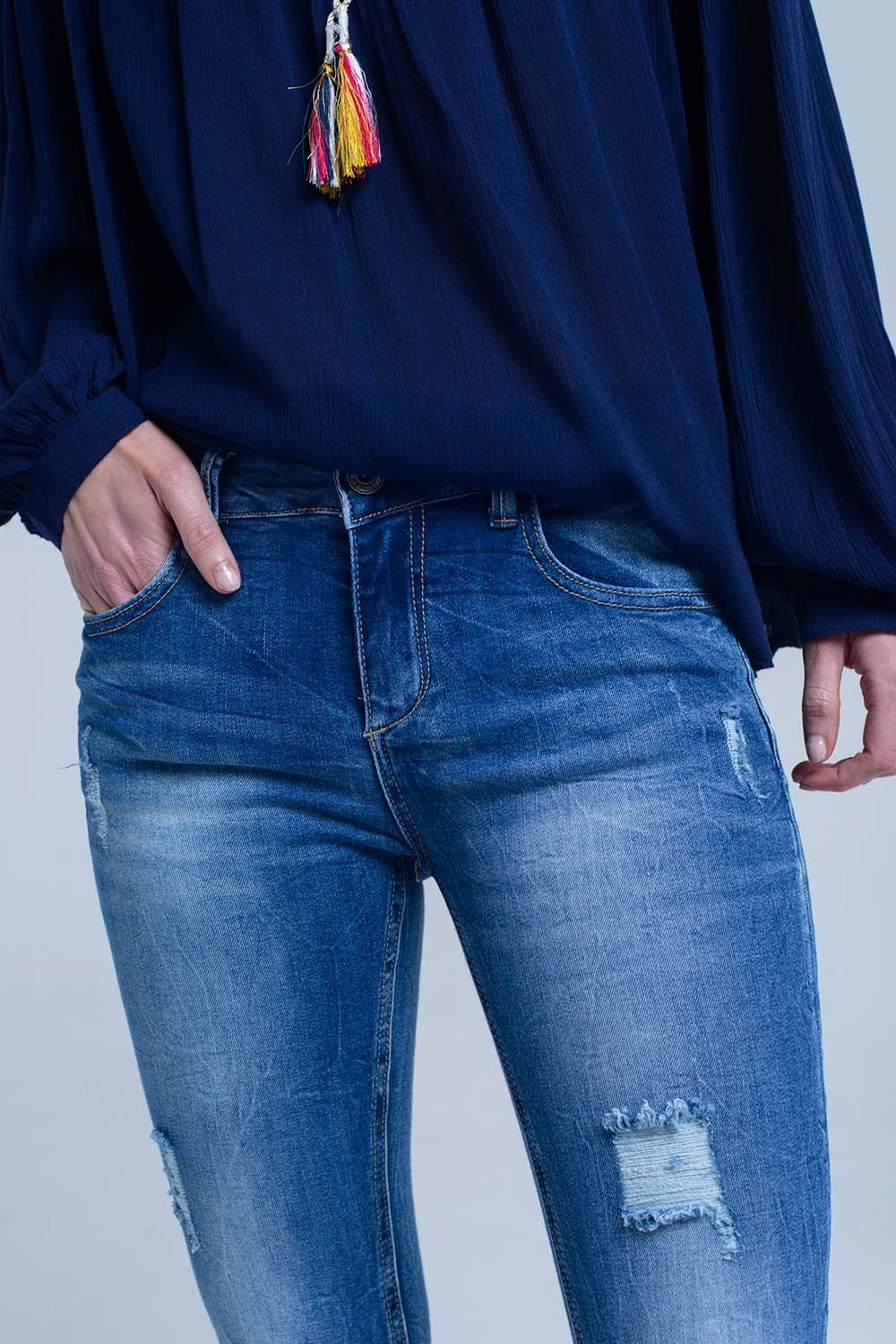 Jean skinny rasgado afligido