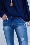 Jean skinny rasgado afligido