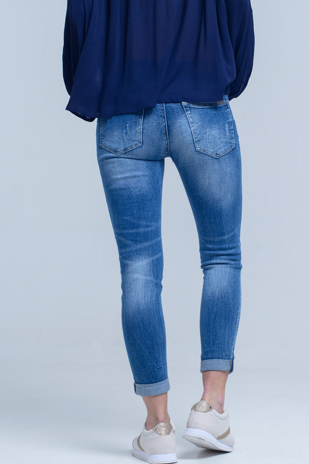 Jean skinny rasgado afligido