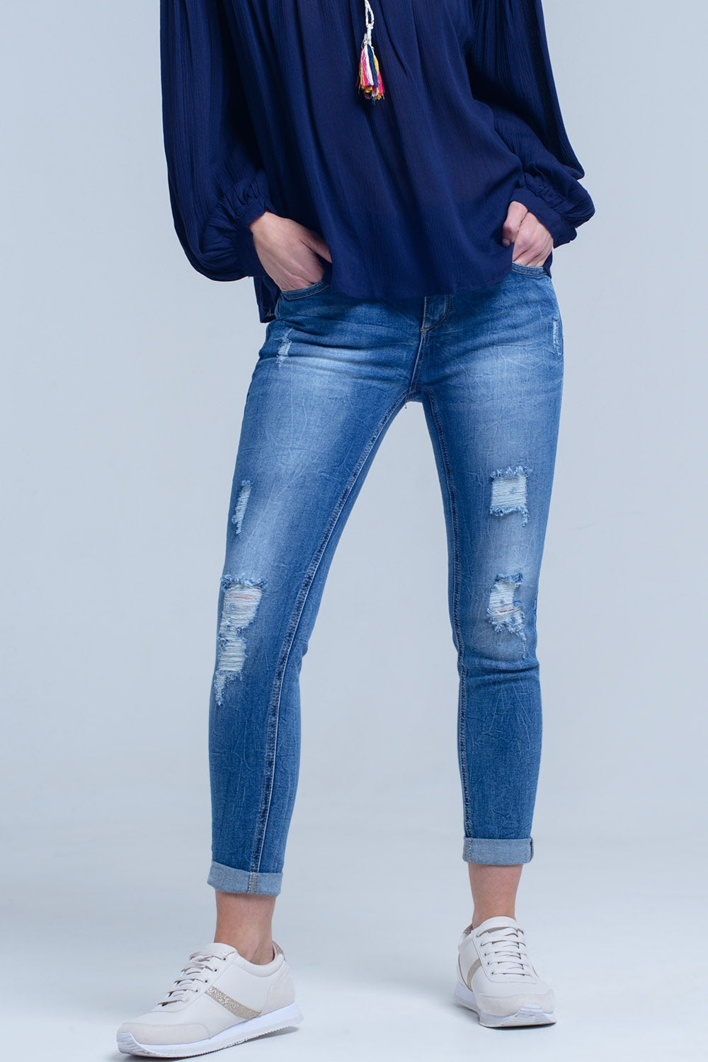 Jean skinny rasgado afligido