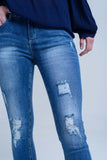 Jean skinny rasgado afligido