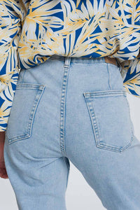 Jeans com bolsos ovóides azuis