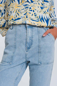 Jeans com bolsos ovóides azuis
