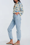 Jeans com bolsos ovóides azuis