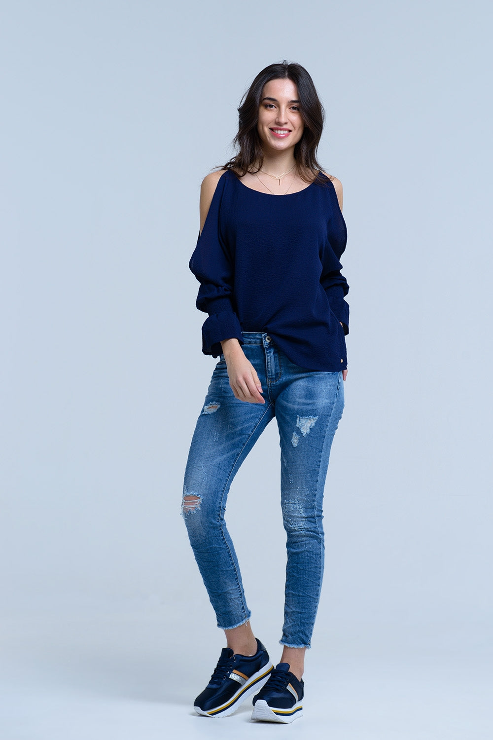 Jeans com detalhes de rips