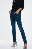 Jeans cravejados olhar de couro