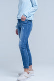 Jeans de tornozelo com rip e reparo