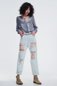 jeans rasgados boyfriend em azul claro