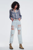 jeans rasgados boyfriend em azul claro