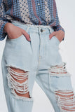 jeans rasgados boyfriend em azul claro