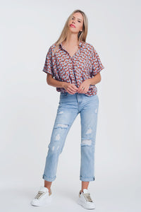 Jeans rasgados straight em denim claro