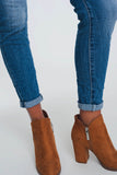 Jeans skinny azul claro com meia cintura