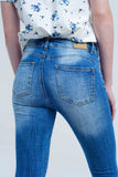 jeans skinny com cores e rugas gastas