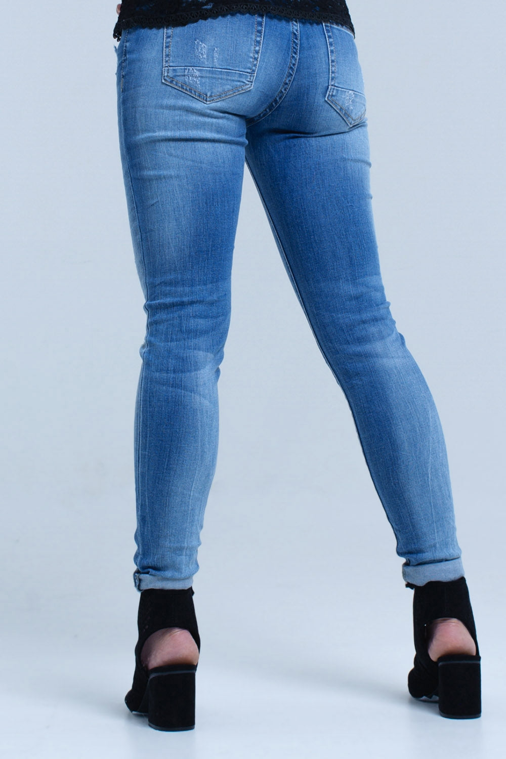 Jeans skinny con strappi