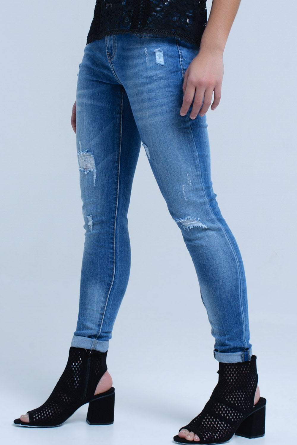 Jeans skinny con strappi