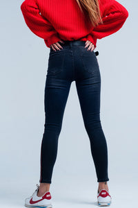 Calças de ganga skinny preto com listra lateral vermelha