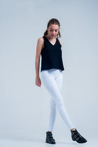Jeggings brancos com bolsos traseiros