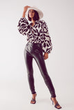 Leggings com aspecto de pele em preto