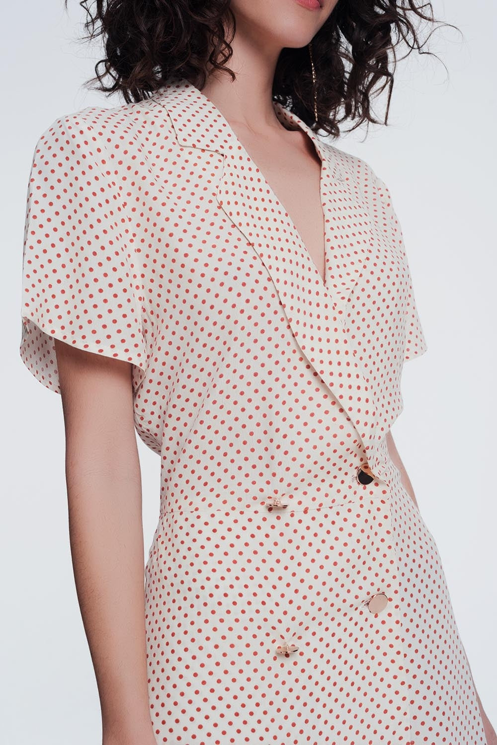 macacão de botão frontal em bege