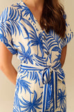 Macacão de Manga Curta com Motivo Tropical em azul e branco