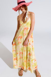 macacão maxi amarelo com estampado tropical