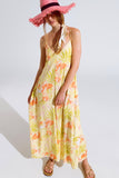 macacão maxi amarelo com estampado tropical