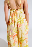 macacão maxi amarelo com estampado tropical