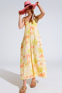 macacão maxi amarelo com estampado tropical