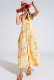 macacão maxi amarelo com estampado tropical