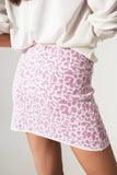 Mini saia de malha fina em estampado lilas