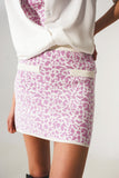 Mini saia de malha fina em estampado lilas