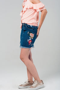 Q2 Mini saia denim com flores bordadas