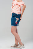 Q2 Mini saia denim com flores bordadas
