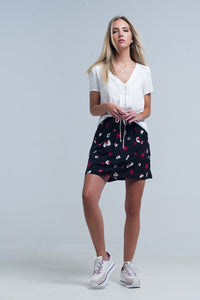 Mini saia preta com padrão floral