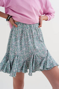 Mini-saia verde com estampas florais e rufos