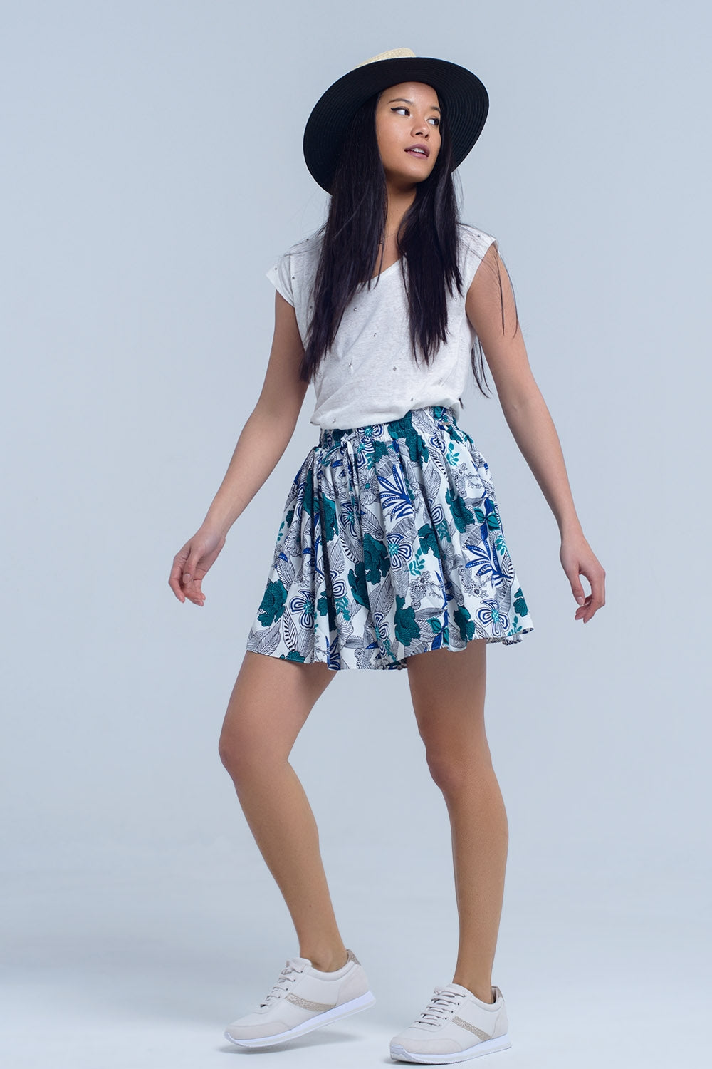 Mini skorts azul com impressão floral
