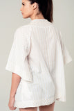 Mini vestido branco com detalhes bordados
