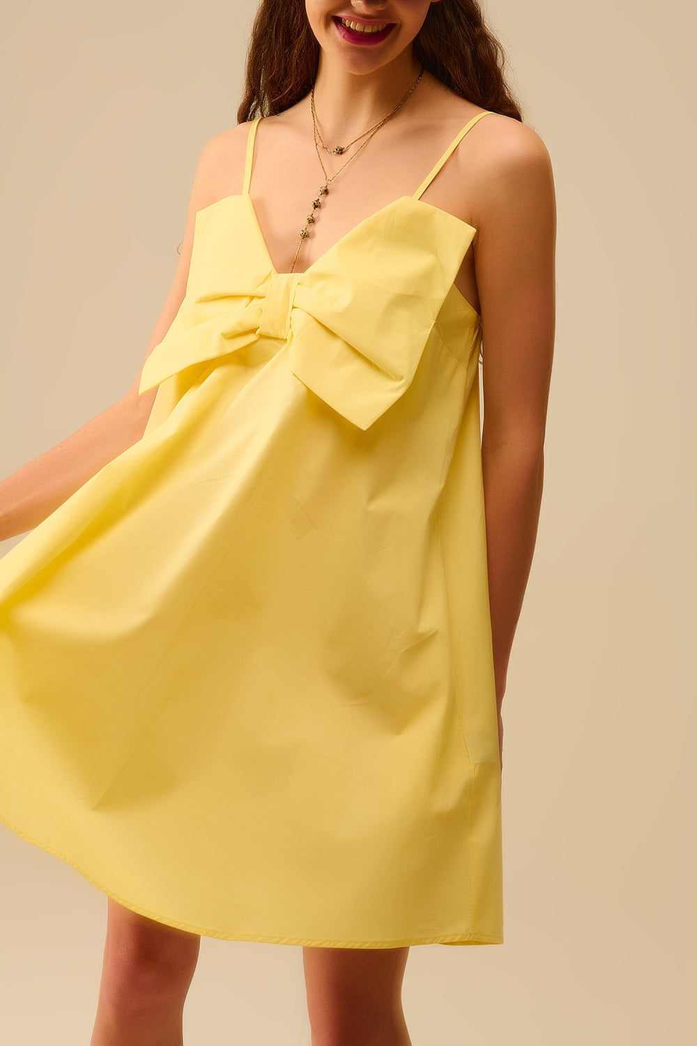 Q2 Minivestido de popelina amarelo com um grande laço