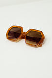 Óculos de sol hexagonais e oversized em tartaruga vintage