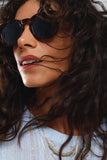Óculos de sol redondos dos anos 90 com lentes pretas e armação em concha castanha escura Toroise