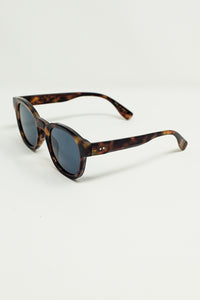Óculos de sol redondos dos anos 90 com lentes pretas e armação em concha castanha escura Toroise