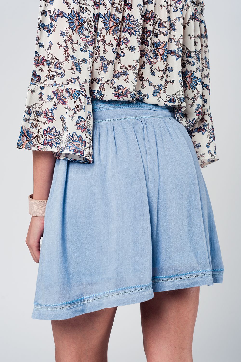 Saia curta azul com Aztec bordado