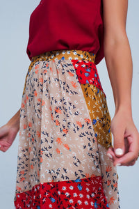 Saia vermelha comprida com estampado de flores