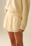 Shorts creme bordados com lantejoulas