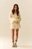 Shorts creme bordados com lantejoulas
