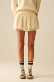 Q2 Shorts creme bordados com lantejoulas