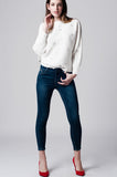 Skinny jeans cintura baixa em denim escuro