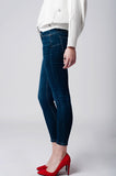 Skinny jeans cintura baixa em denim escuro
